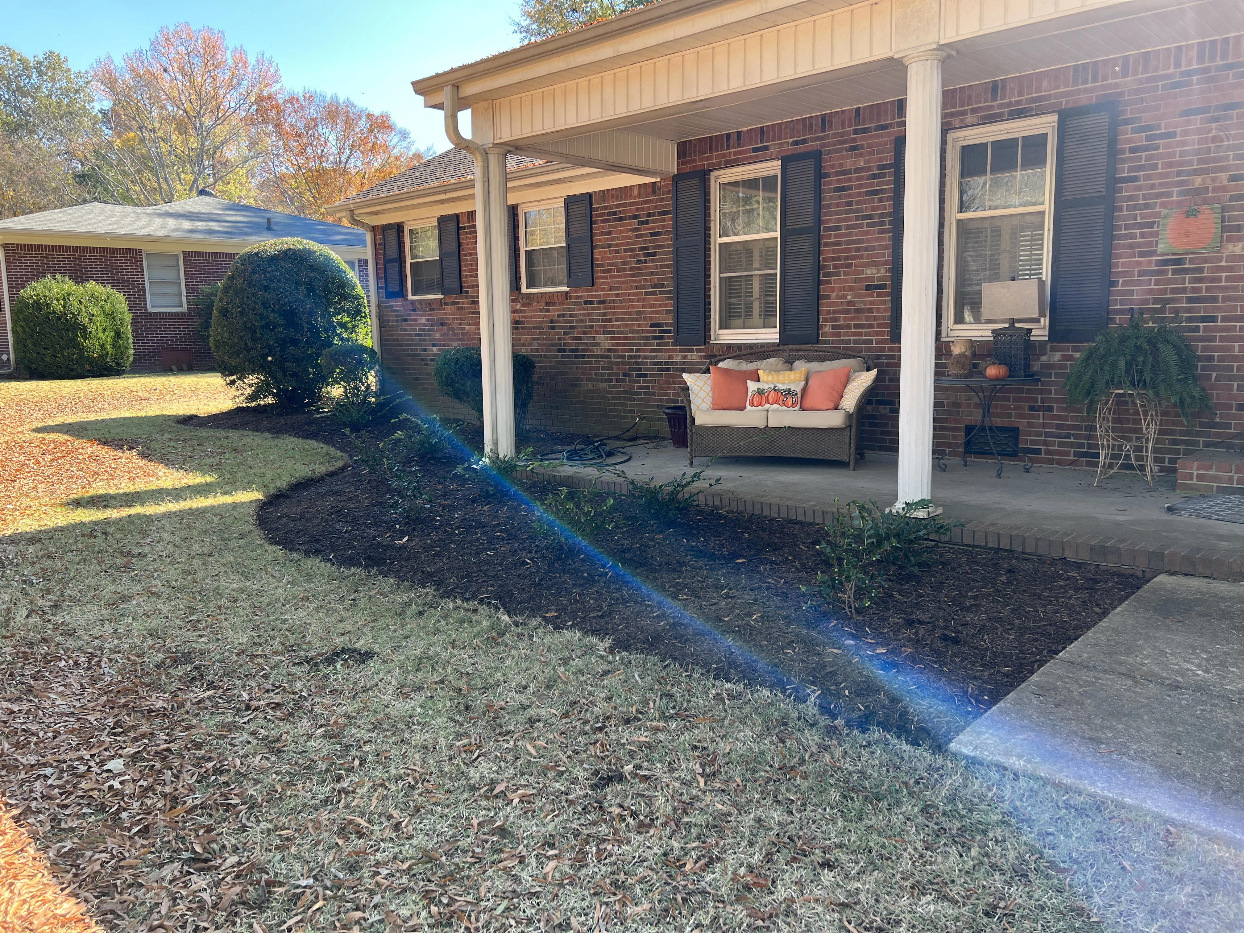 Front lawn of a satisfied customer receiving lawn mowing and maintenance services from Wakefield L&L.